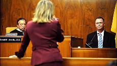 Judge Venezia looks on while Assistant Bergen County Prosecutor Carol Novey Catuogno questions Peter Innes. 
